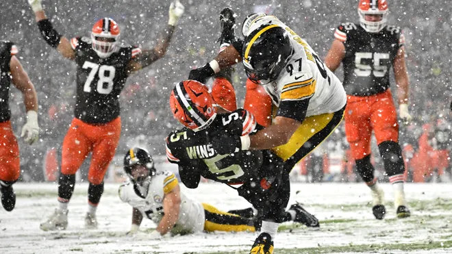 Nick Chubb’s Snowy TD Propels Browns to Victory – Get the Best Steelers & Browns Sports Cards Here!