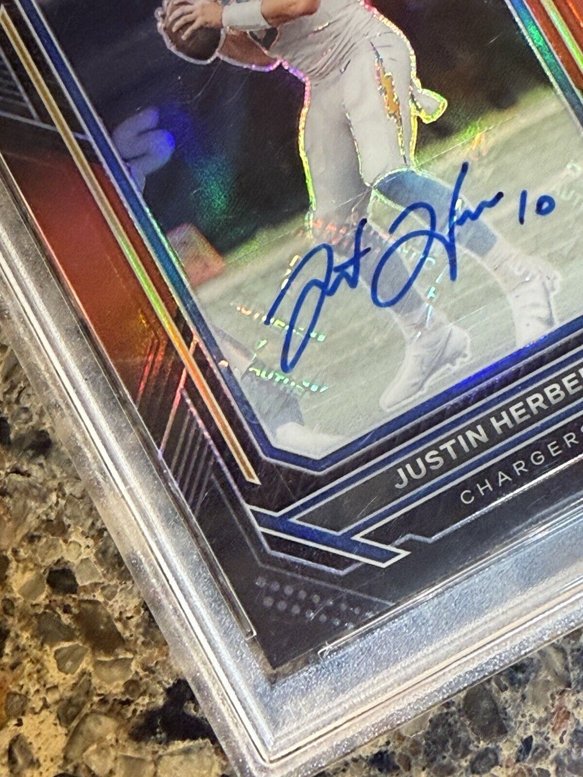 Justin Herbert 2022 Panini Chronicles Prizm Black Signature Red /99 Auto PSA 10