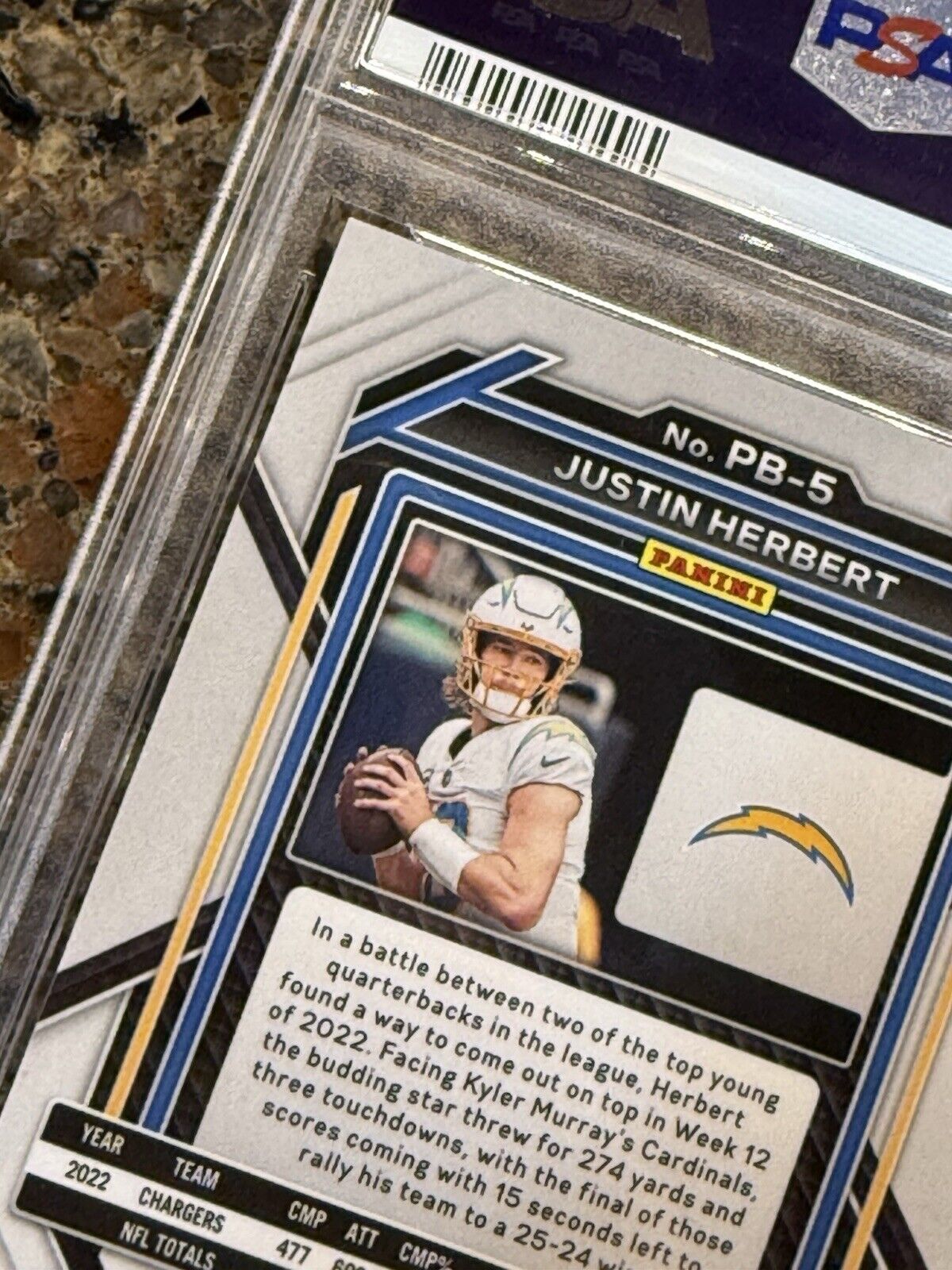 Justin Herbert 2022 Panini Chronicles Prizm Black Signature Red /99 Auto PSA 10