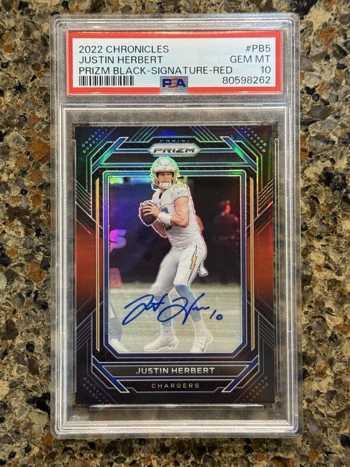 Justin Herbert 2022 Panini Chronicles Prizm Black Signature Red /99 Auto PSA 10