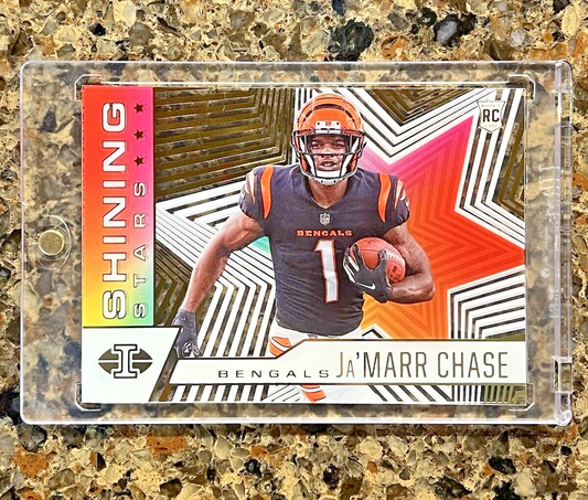 Ja’Marr Chase 2021 Panini Illusions Football Shining Stars Gold Holo Acetate RC